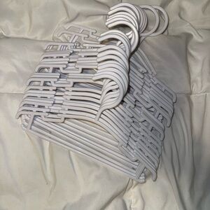 25 Set of White Plastic Hangers